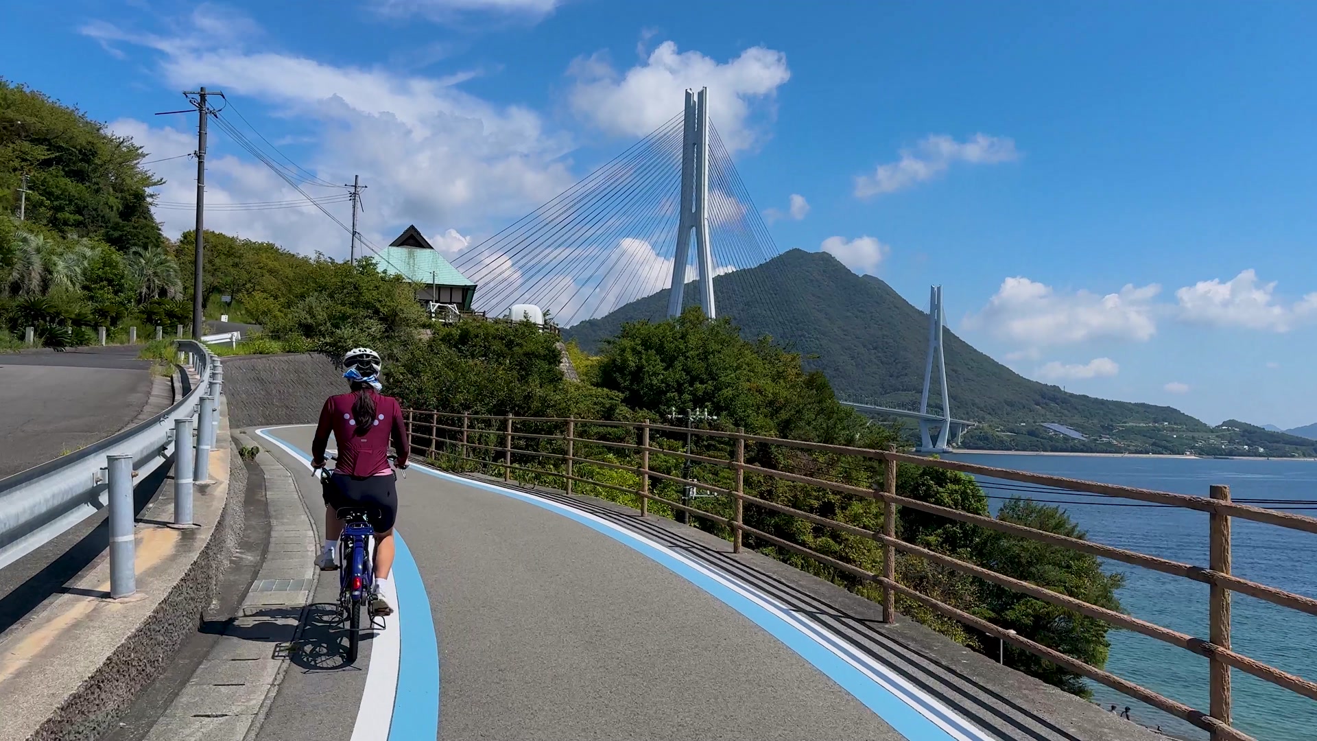 Cycling beside Tatara Bridge and the Seto Inland Sea on the Shimanami Kaido