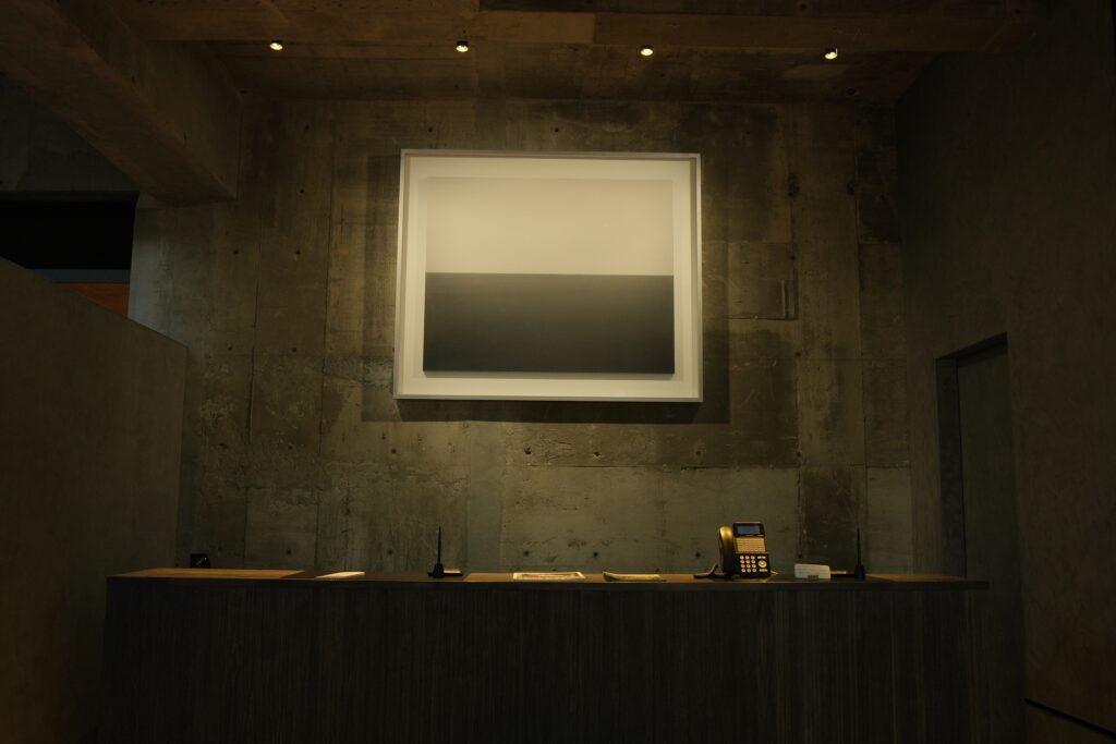 The front desk at Shiroiya Hotel, where staff can help with travel arrangements